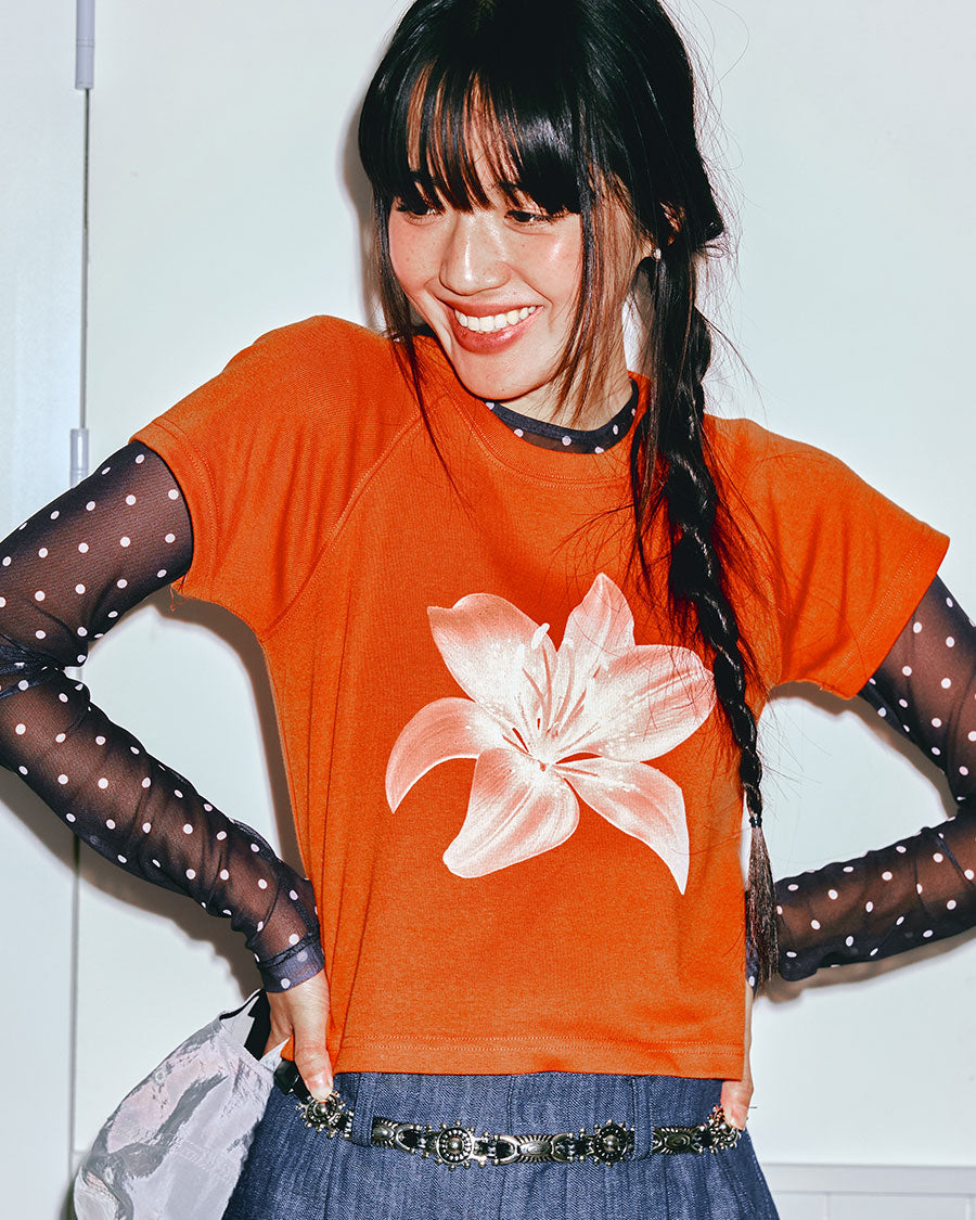 snuggiest-ss-24-flower-xray-raglan-tee-orange-orchid