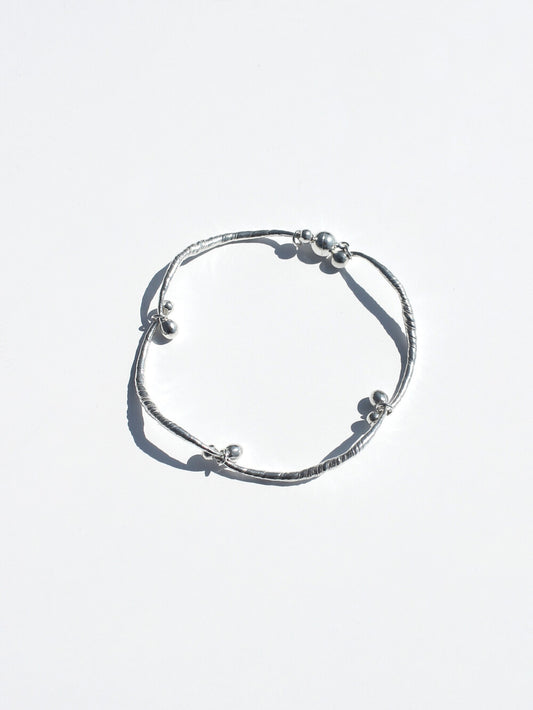 inodore-seasonless-shell-weaved-bracelet